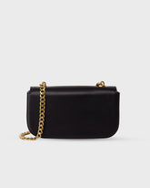 Bolso Iconic Bag No.1 en cuero vegano negro con cadena dorada y logo grabado, diseño versátil y elegante de Di Conza