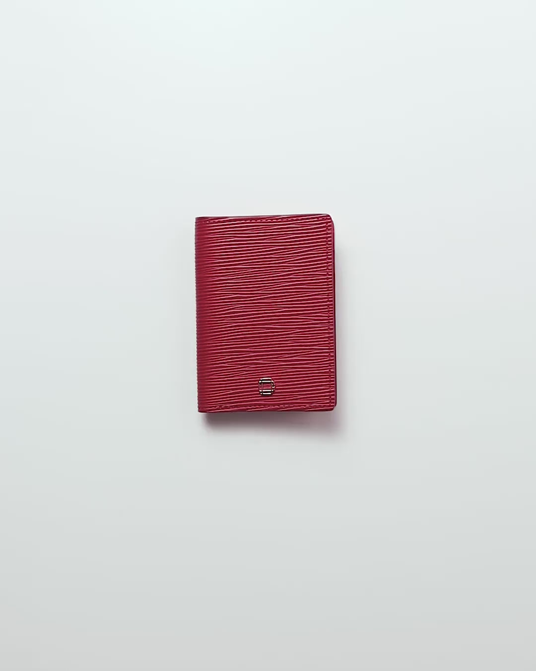 CARTERA VERTICAL DE CUERO ROJO UNISEX