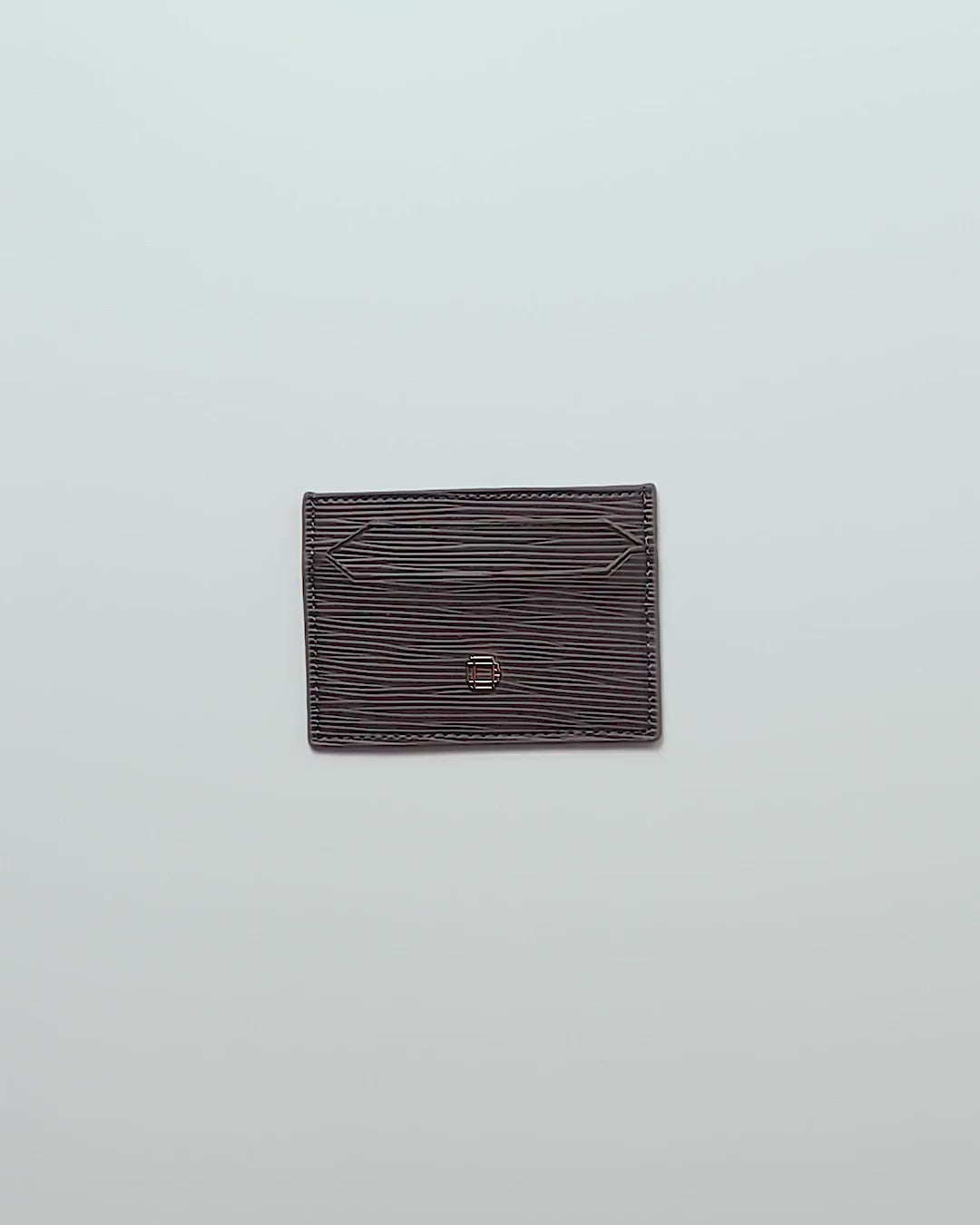 TARJETERO COMPACTO DE CUERO GRIS
