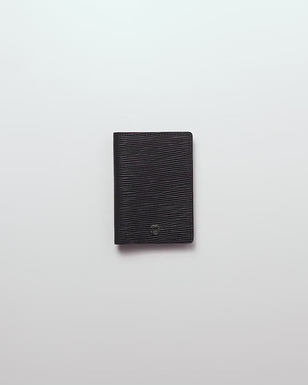 CARTERA VERTICAL DE CUERO NEGRO UNISEX