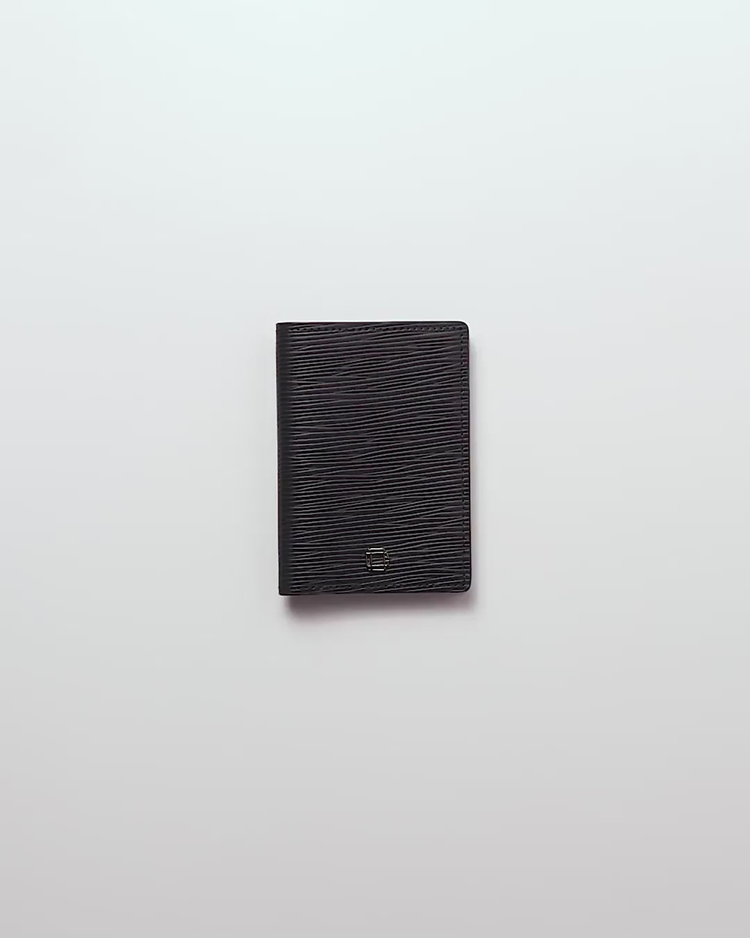 CARTERA VERTICAL DE CUERO NEGRO UNISEX